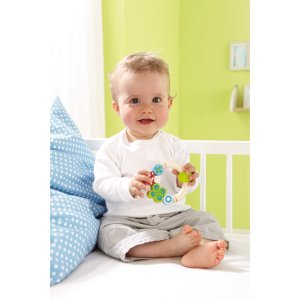 so nanizani na elastiko. Na eni strani je trdno pritrjen zvonec,